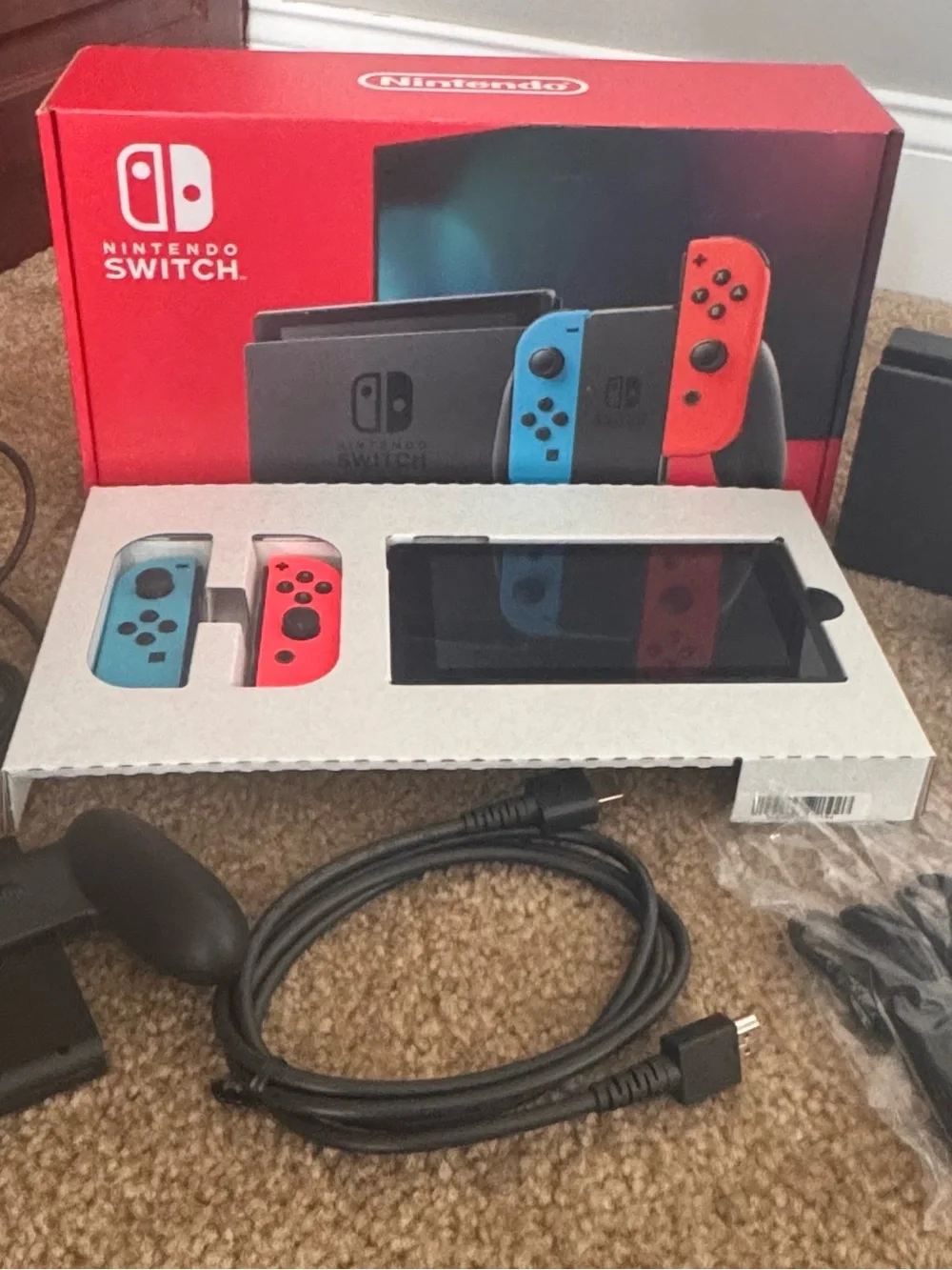 Nintendo Switch with Neon Blue Left and Neon Red Right Joy‑Con Pair